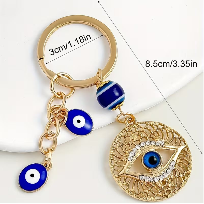 Elegant Blue Eye -Encrusted Keychain with Golden-Tone Chain & Beads -