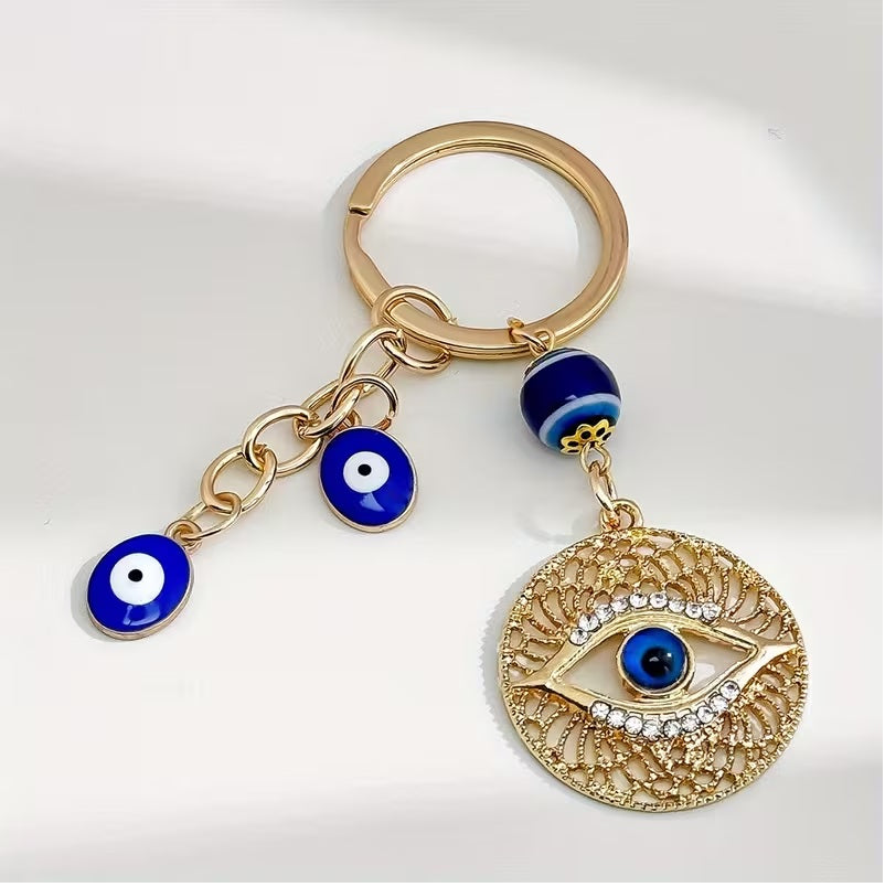 Elegant Blue Eye -Encrusted Keychain with Golden-Tone Chain & Beads -